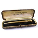 An early 20th century hallmarked 9ct gold mechanical pencil,