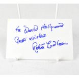 ROBERT LUDLUM; a piece of card bearing the author's signature with presentation inscription.