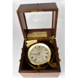 An early 20th century cased and gimbal mounted marine chronometer,
