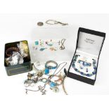 A quantity of costume jewellery to include modern enamelled items including butterfly brooch,