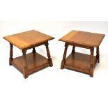A matched pair of modern square top oak coffee/occasional tables, the square tops with shaped edge,