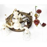 Three vintage light fittings comprising a wagon wheel style example with six wooden light fittings,