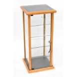 A modern tabletop display case with four internal glass shelves, 99 x 44 x 44cm.