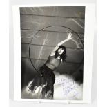 KATE BUSH; a black and white photograph inscribed 'To David, keep smiling',