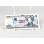 FIDEL CASTRO; four Cuban pesos notes, one bearing the signature of Fidel Castro,