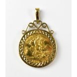 A Queen Elizabeth II half sovereign, London 1991, in a 9ct gold coin necklace mount, approx 6.2g.