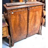 A reproduction crossbanded mahogany two-door side cabinet, later converted to a hi-fi cabinet,