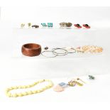 A quantity of costume jewellery to include necklaces, white metal items, brooches, etc.