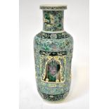 A Chinese Famille Verte reticulating vase c1800-1820 of shouldered tapering form and comprising