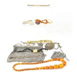 Various items of costume jewellery to include an amber-style necklace with forty-one graduated