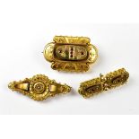 Two 19th century yellow metal brooches in typical Victorian style,