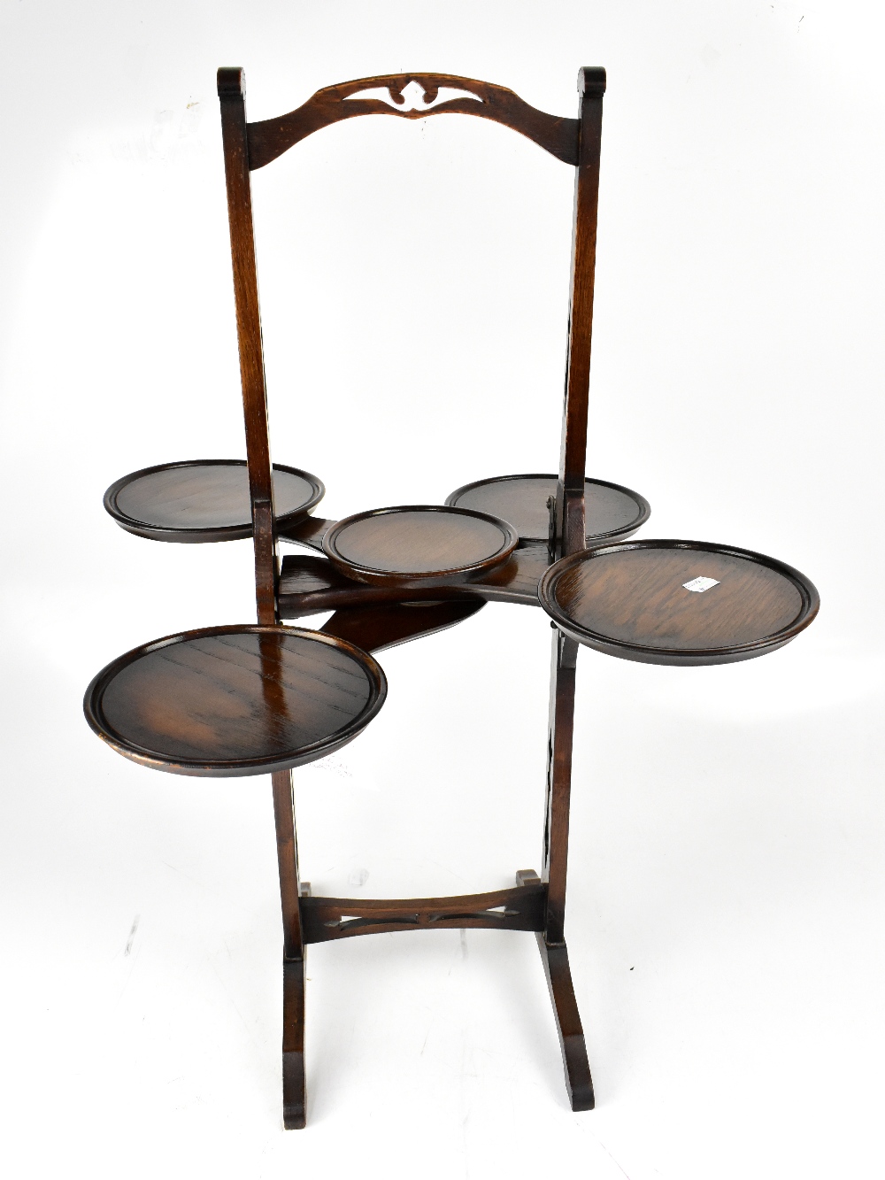 A circa 1920s Pioneer Stores oak monoplane cake stand, 78 x 60cm when extended.