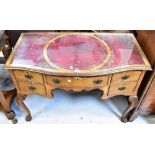 A reproduction walnut Georgian-style serpentine fronted lowboy,