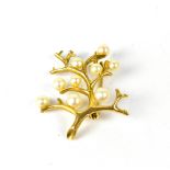 A modern 9ct gold and pearl brooch in the form of a tree, the cultured pearls representing blossoms,