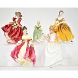 ROYAL DOULTON; a group of four figures, HN2229 'Southern Belle', HN1937 'Top 'O' The Hill',