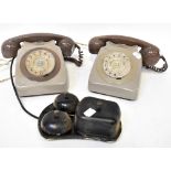 Two British Telecom analogue telephones in grey and mushroom, both numbered tele8746R BTQC/CCF,