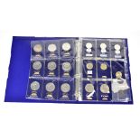 CHANGE CHECKER; an album containing various Change Checker packet uncirculated coins, mostly crowns,