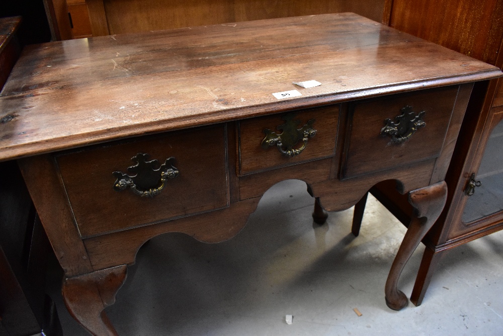 A 19th century oak lowboy, the moulded top above three frieze drawers and shaped apron, - Image 2 of 8