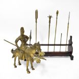 An early/mid-20th century brass Oriental warrior on horseback with jewel-coloured stones to armour