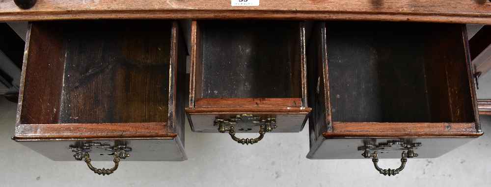 A 19th century oak lowboy, the moulded top above three frieze drawers and shaped apron, - Image 4 of 8