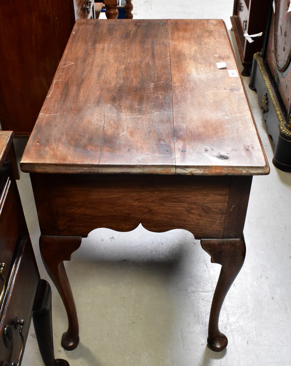A 19th century oak lowboy, the moulded top above three frieze drawers and shaped apron, - Image 7 of 8