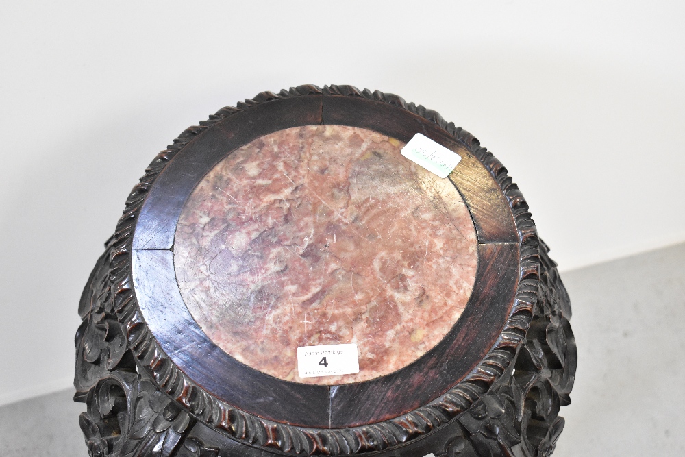 An Oriental carved hardwood jardinière stand, with rouge marble inset panel to the top, - Image 2 of 2