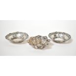 A pair of Victorian hallmarked silver pierced dishes, William Davenport,