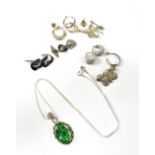 A quantity of silver and white metal jewellery to include a hallmarked silver leaf brooch,