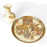 An early 20th century Japanese Satsuma charger with raised figural decoration of warlords and