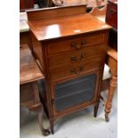 An Edwardian mahogany music cabinet with satinwood string inlay,