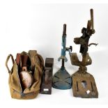 A vintage canvas tool bag containing a number of vintage tools to include wooden planes,