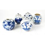 A group of five Oriental ginger jars with various decoration to include scenic panel decoration,