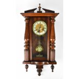 A late 19th/early 20th century mahogany cased spring-driven Vienna wall clock,