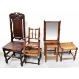 A Georgian oak side chair with solid panel back and seat,