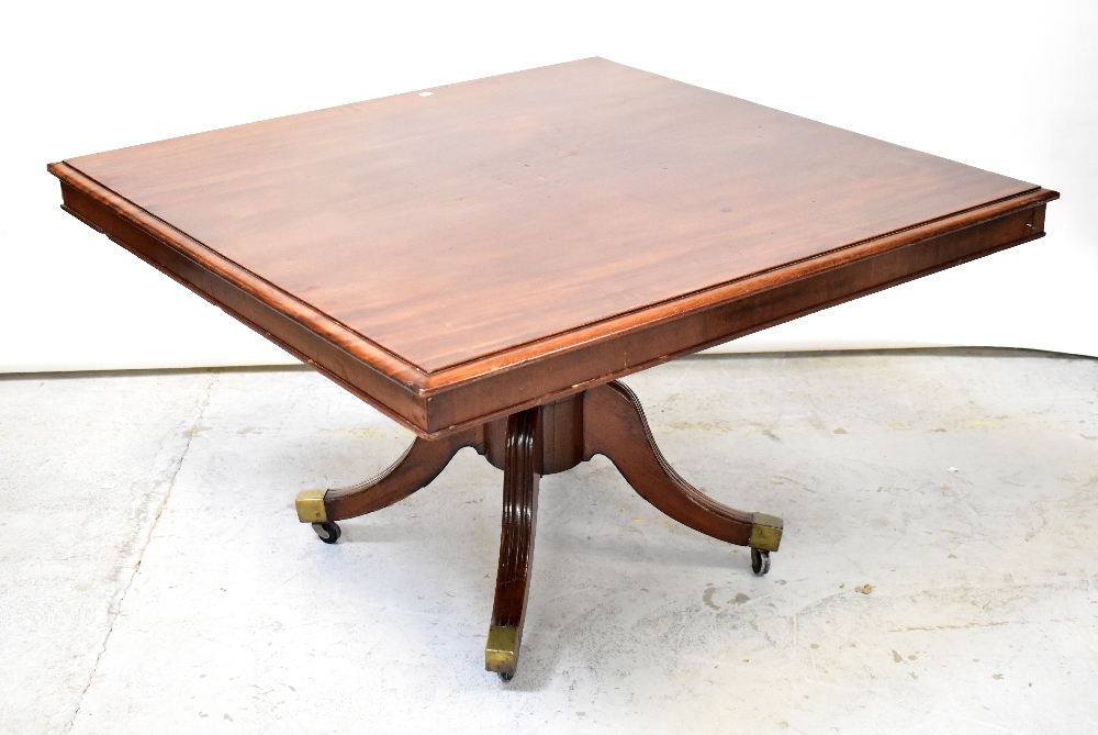 A 19th century mahogany square tilt-top table,