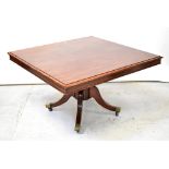 A 19th century mahogany square tilt-top table,