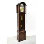 JAYCEE; a reproduction oak cased eight day triple-weighted Westminster chiming longcase clock,