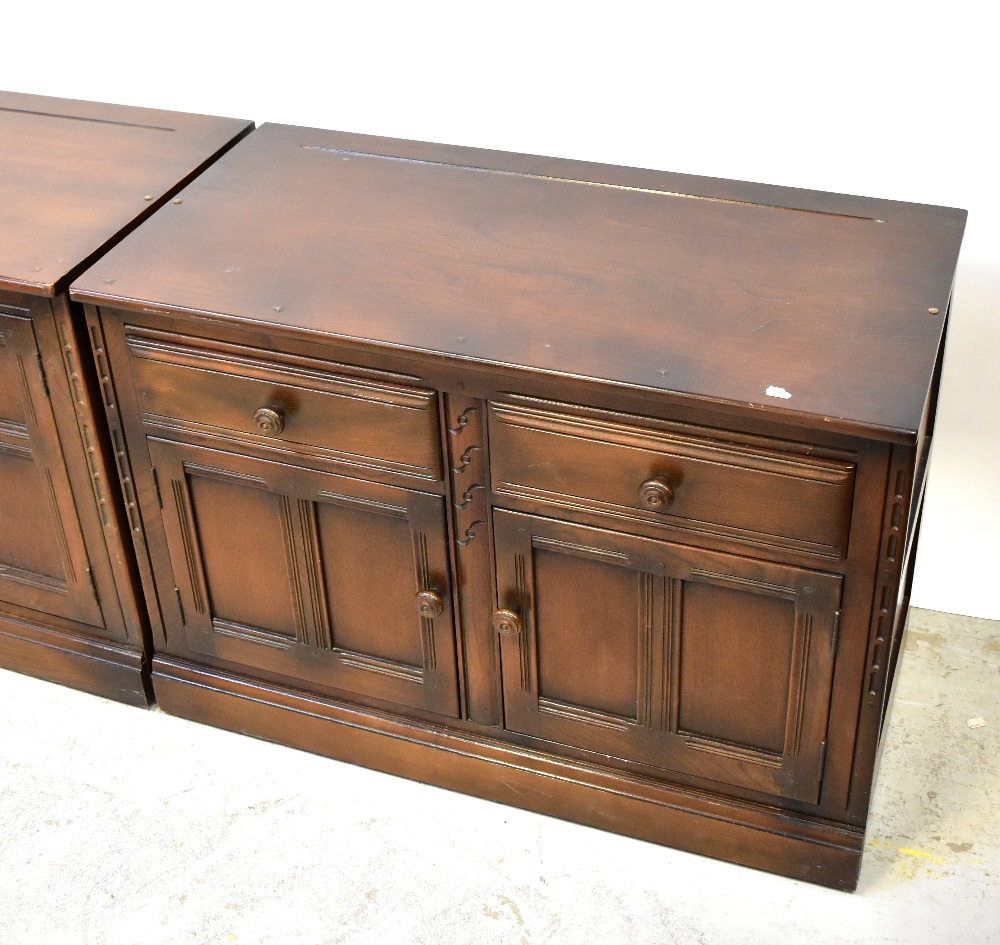 ERCOL; two dark dresser bases, one with a pair of fielded and panelled cupboard doors, - Image 2 of 6