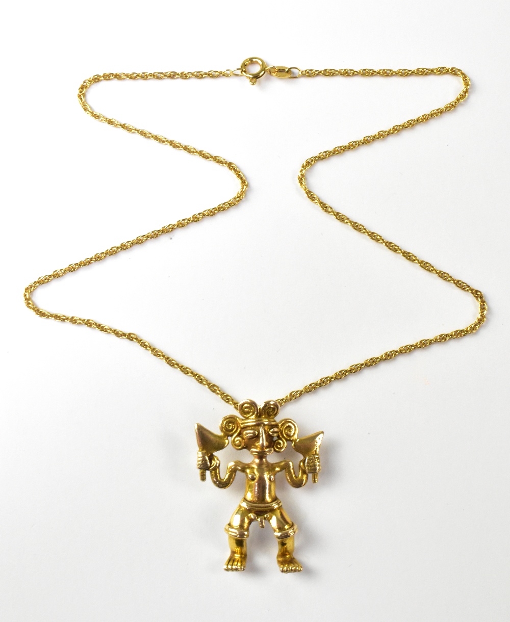 A 9ct yellow gold Aztec pendant on a 9ct yellow gold link chain, combined approx 10g.