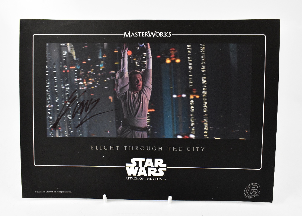 STAR WARS; 'Attack of the Clones', a promotional card bearing the signature of Ewan McGregor.