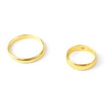 Two 22ct yellow gold wedding bands comprising a gentlemen's band engraved to interior 'THESS',