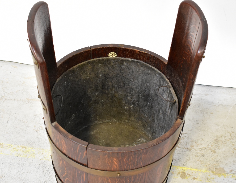 A lidded tub stool fashioned from a brass bound oak coopered barrel, height 63cm, diameter 44cm. - Image 2 of 3