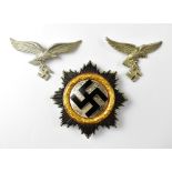 A German Third Reich WWII 'War Order of the German Cross' with gold laurel wreath surround,