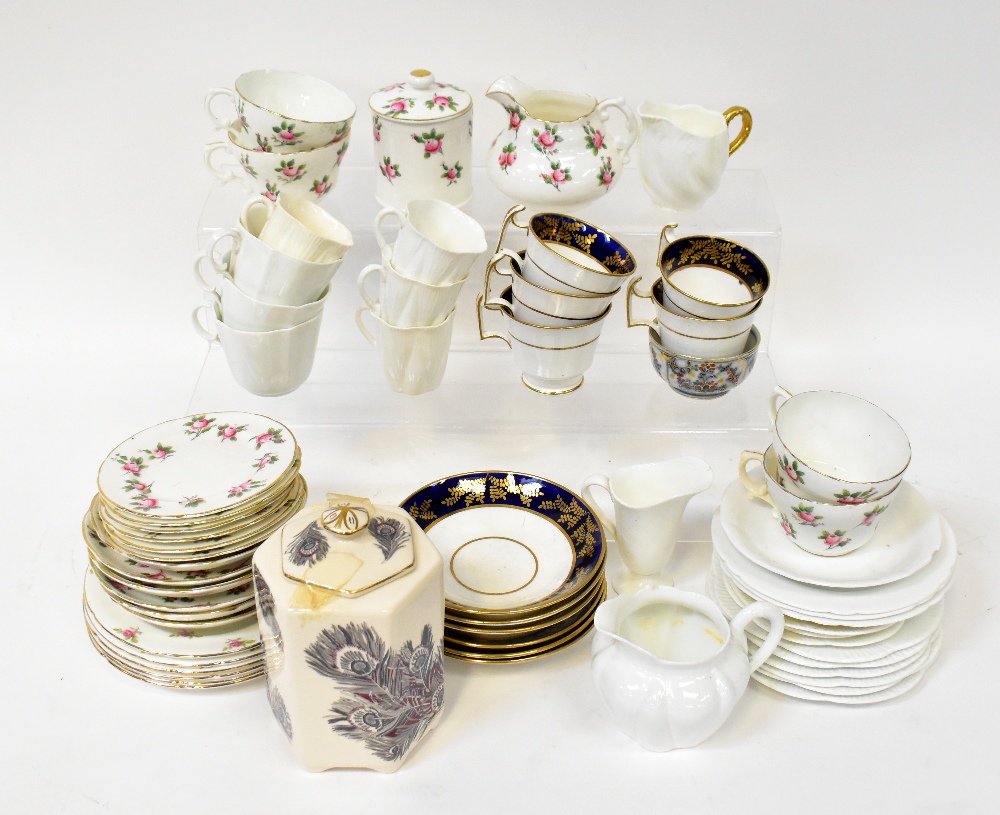 A Hammersley part tea service to include cups, saucers, lidded sugar bowl and jug,