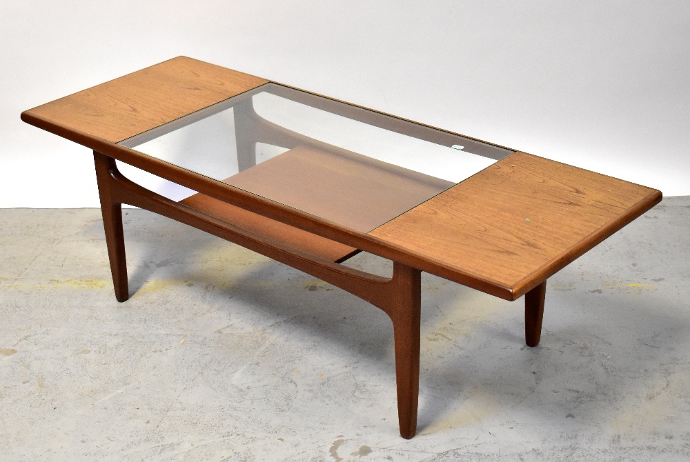 G-PLAN; a retro teak glass-topped two-tier coffee table, 43 x 137 x 50cm.