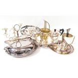 A quantity of plated ware to include a tazza, tankards, covered tureen, sauce boats, candelabra,