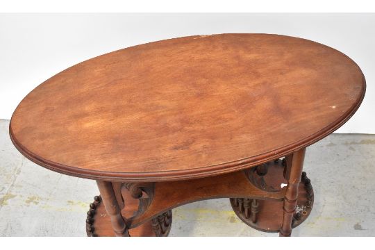 An Edwardian mahogany oval top writing table, possibly American, with carved and shaped undershelf, - Image 2 of 6