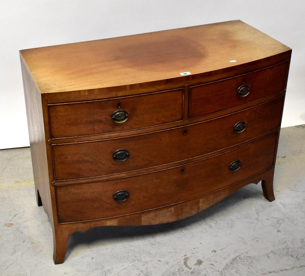 A Georgian mahogany bow-fronted chest of two short and two long drawers,