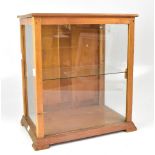 A vintage countertop display unit, three glazed panels and one glazed shelf to interior,