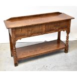 MONASTIC WOODCRAFT FURNITURE LTD; an oak buffet sideboard,